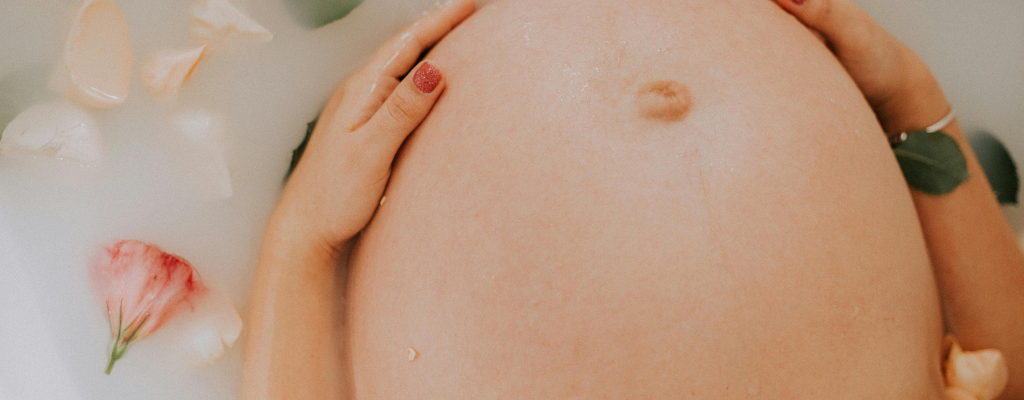 pregnant woman having a bath